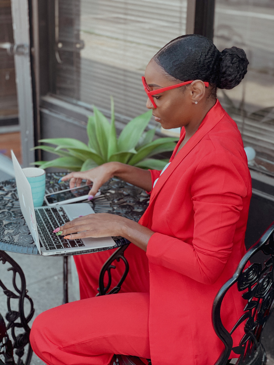 Woman using Laptop Computer Outdoors 
